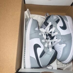 Grey and white Air Jordan 1s